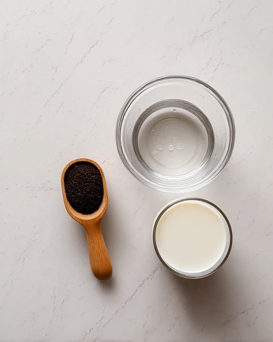 The image shows three items lined up on a white marbled surface. On the left, there is a small wooden scoop filled with dark brown coffee grounds. In the middle, there is a clear glass bowl with a few drops of water at the bottom, showing a transparent, smooth texture. On the right, there is a clear glass filled with fresh white milk, smooth and full almost to the top. The scene is evenly lit without shadows, presenting a simple and clean arrangement photo taken with an iphone --ar 4:5 --v 7