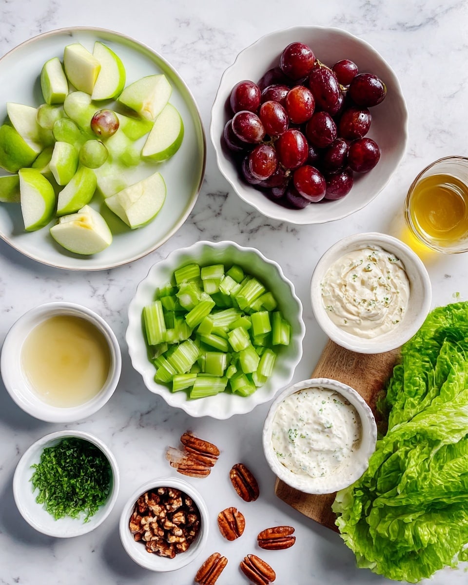 The image shows a clean white marbled surface with several white bowls and plates each holding different ingredients arranged neatly. There is a plate on the left with light green apple pieces, a bowl above it filled with dark red grapes sliced in half. At the center, a bowl contains chopped celery with its bright green color. Around these are smaller white bowls and one scalloped bowl, holding creamy mayonnaise, green chopped herbs, a light yellow liquid, honey, salt, and white yogurt. To the right, fresh leafy romaine lettuce is placed on a wooden board. Scattered on the surface are some brown pecan nuts. The scene is bright and fresh, with each ingredient clearly visible and separated. Photo taken with an iphone --ar 4:5 --v 7
