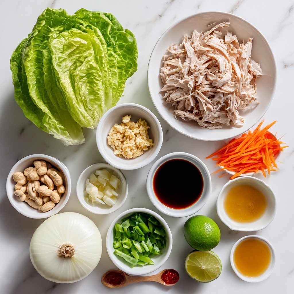 The image shows fresh ingredients arranged on a white marbled surface. At the top center is a whole green butter lettuce with its soft, layered leaves. Below it, in a white bowl, are shredded cooked chicken pieces with a light pinkish hue. To the right of the chicken is a small white bowl filled with thin, bright orange carrot strips. On the left side, a small white bowl holds chopped cashew nuts in pale beige and light brown colors. Above the cashews is a smaller white bowl with minced garlic that is creamy white. Below the cashews is another small white bowl with sliced green onions. In the center bottom, there is a half white onion showing a smooth white inner layer with a hint of brown skin. To the right of the onion are two lime halves, vibrant green inside. Near the limes is a tiny wooden spoon with red chili sauce. At the bottom center there is a white bowl of dark soy sauce, flanked by two small bowls with light golden mustard seeds and honey-colored liquid sauces. The ingredients are neatly placed, with bright and fresh colors. Photo taken with an iphone --ar 4:5 --v 7