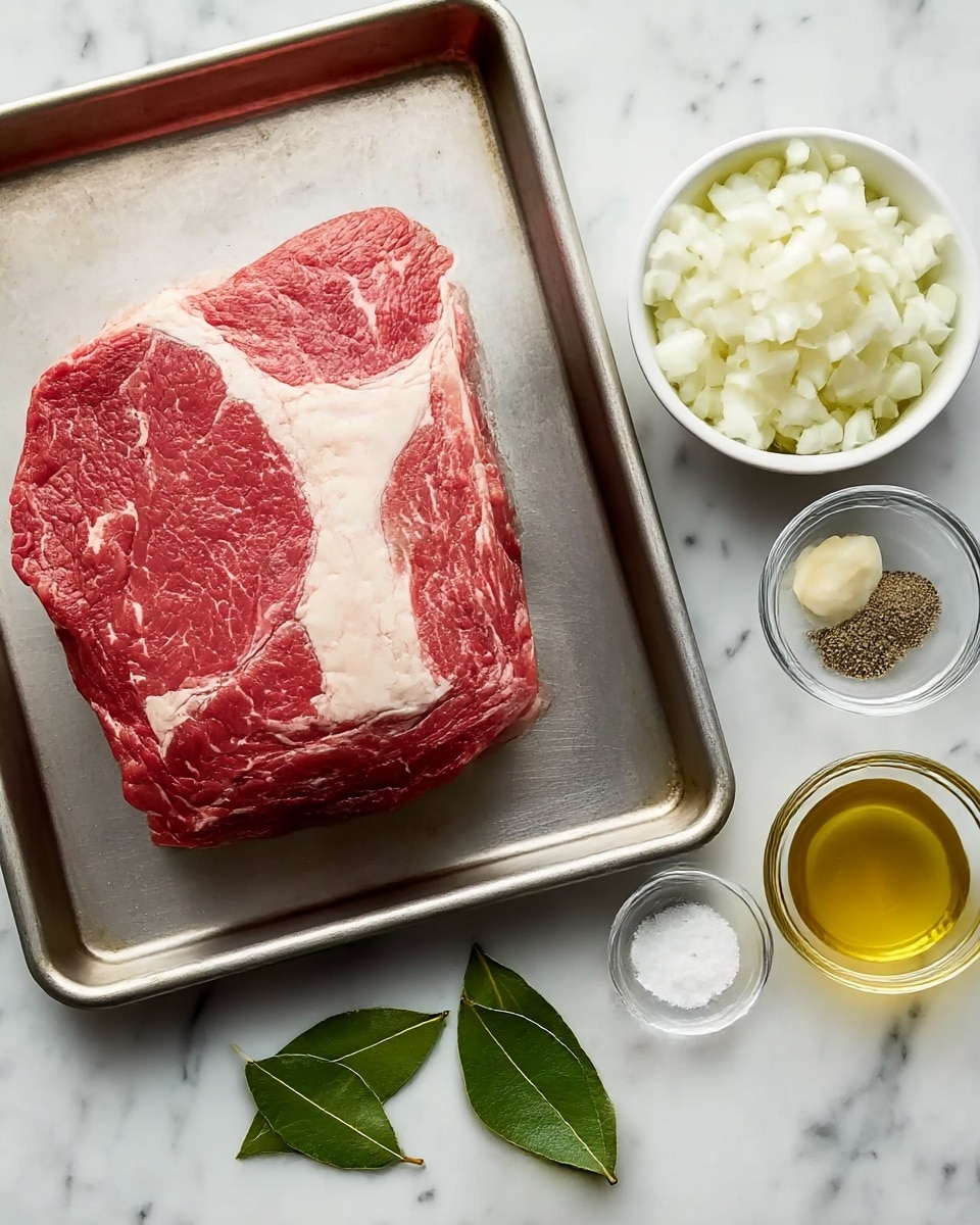 A large raw piece of red meat with white fat layers lies in the middle of a metal baking tray on a white marbled surface. To the right of the tray, there is a white bowl filled with chopped white onions, and near it are small clear bowls with chopped garlic, coarse salt, and ground black pepper. Two fresh green bay leaves rest flat on the surface below the bowls. Next to them is a small amount of golden yellow liquid in a clear bowl. The overall setup is clean and simple, with each ingredient clearly visible and arranged neatly. photo taken with an iphone --ar 4:5 --v 7