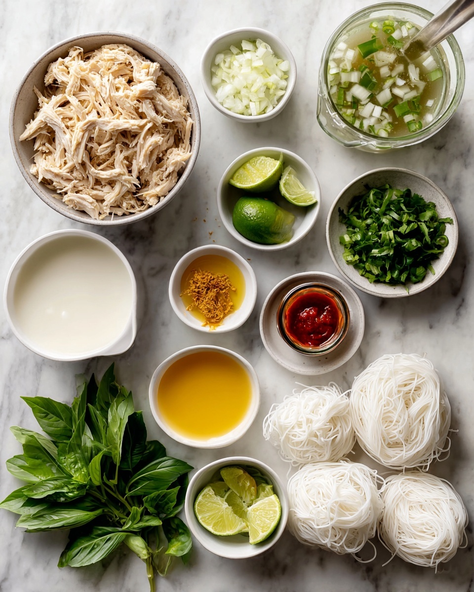 The image shows a collection of ingredients arranged neatly on a white marbled surface. In the top left, there is one large white bowl filled with shredded cooked chicken. Next to it, a smaller white bowl contains chopped white onion. To the right, a carton of chicken broth is partially visible, with a woman's hand pouring it into a white bowl filled with creamy white coconut milk. Below these, several small white bowls hold bright yellow olive oil, finely minced garlic, and grated ginger, all side by side. A small jar of red curry paste lies near the center, tilted slightly, next to two bundles of white rice noodles on the right. Fresh lime wedges are placed near the bottom middle of the image, surrounded by fresh green herbs: a white bowl of chopped scallions on the left, fresh basil leaves spread out below the scallions, and another white bowl with cilantro to the right near the lime wedges. The colors are vibrant, focusing on natural greens, whites, and yellows, all set on a clean, elegant white marbled background. photo taken with an iphone --ar 4:5 --v 7