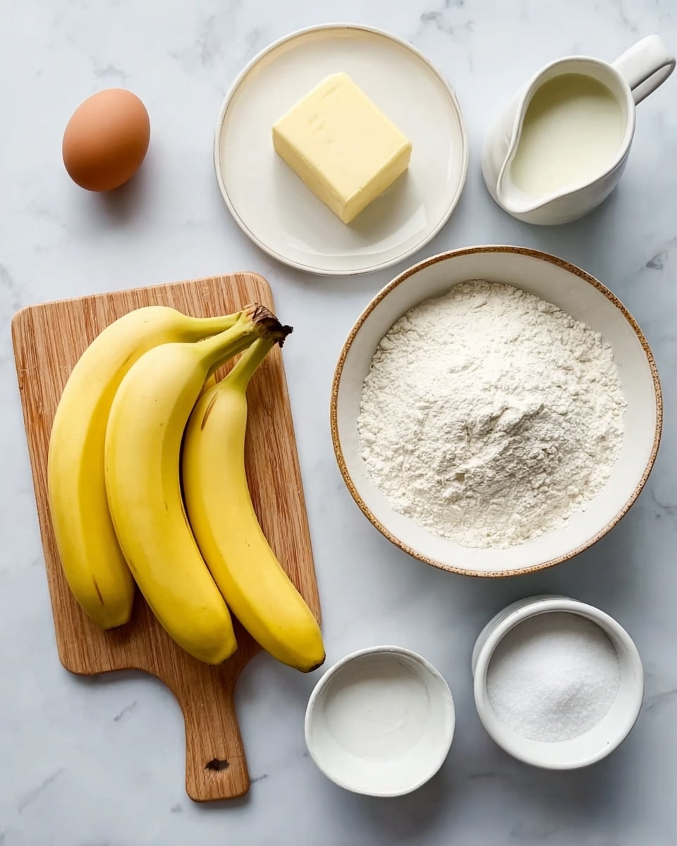 The image shows a neat arrangement of banana bread ingredients on a white marbled surface. At the center left, three yellow bananas rest on a small wooden cutting board with a smooth texture. To their top left are a brown egg and a small white plate holding a stick of light yellow butter. To the right of the bananas is a large white bowl filled with white flour with a light golden rim. Below the flour bowl is a white pitcher containing creamy white yogurt. On the right side of the image, two small white bowls hold white salt and white baking soda, sitting next to each other. The overall look is clean with neat layers of ingredients spread on the smooth marbled background. photo taken with an iphone --ar 4:5 --v 7