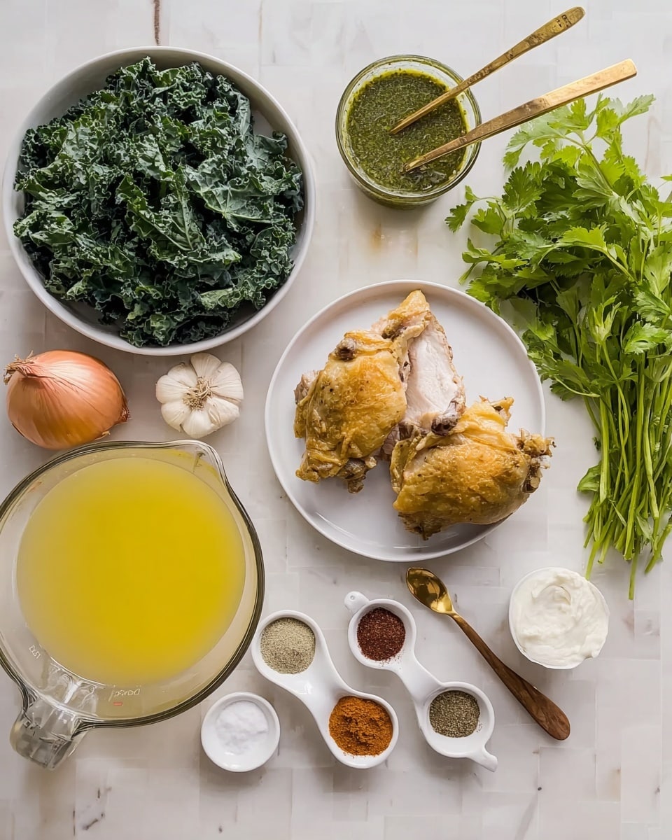 The image shows several ingredients on a white marbled surface arranged neatly. In the center left, there is a small white bowl full of chopped green kale leaves with a rough texture. Next to it is a clear glass measuring cup filled with pale yellow broth. Below the kale bowl is a small white container holding yellow olive oil. In the middle of the image on a small white plate, there are two cooked chicken pieces with a golden brown skin and white meat inside. To the top right of the chicken are two gold measuring spoons: one filled with green sauce with visible herbs and the other empty but leaning on it. Nearby, a small round white bowl contains coarse white salt. Around the salt, there are three white spoons with spices: brownish-green powder in a metal spoon, dark red powder in a wooden spoon, and a mix of spices in another metal spoon. A whole yellow onion, three garlic cloves, and a bunch of fresh green cilantro with leafy stems are arranged to the right side. Everything is placed on a clean white marbled background. photo taken with an iphone --ar 4:5 --v 7