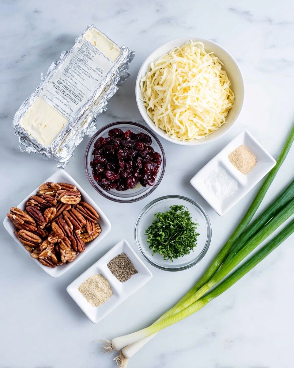 The image shows several ingredients arranged on a white marbled surface. At the top left, there is a silver-foil wrapped block of cream cheese. To its right is a white bowl filled with shredded pale yellow cheese. Below the cream cheese is a clear glass bowl with dark red dried cranberries. Next to it on the right is a small white square dish holding finely chopped green herbs. Below that, there is a clear glass bowl filled with light brown pecans. At the bottom left corner of the image, part of a white dish holds four spices arranged in separate sections: white salt, beige garlic powder, black pepper, and another beige spice. At the very bottom right, there are two long green onions lying diagonally. photo taken with an iphone --ar 4:5 --v 7