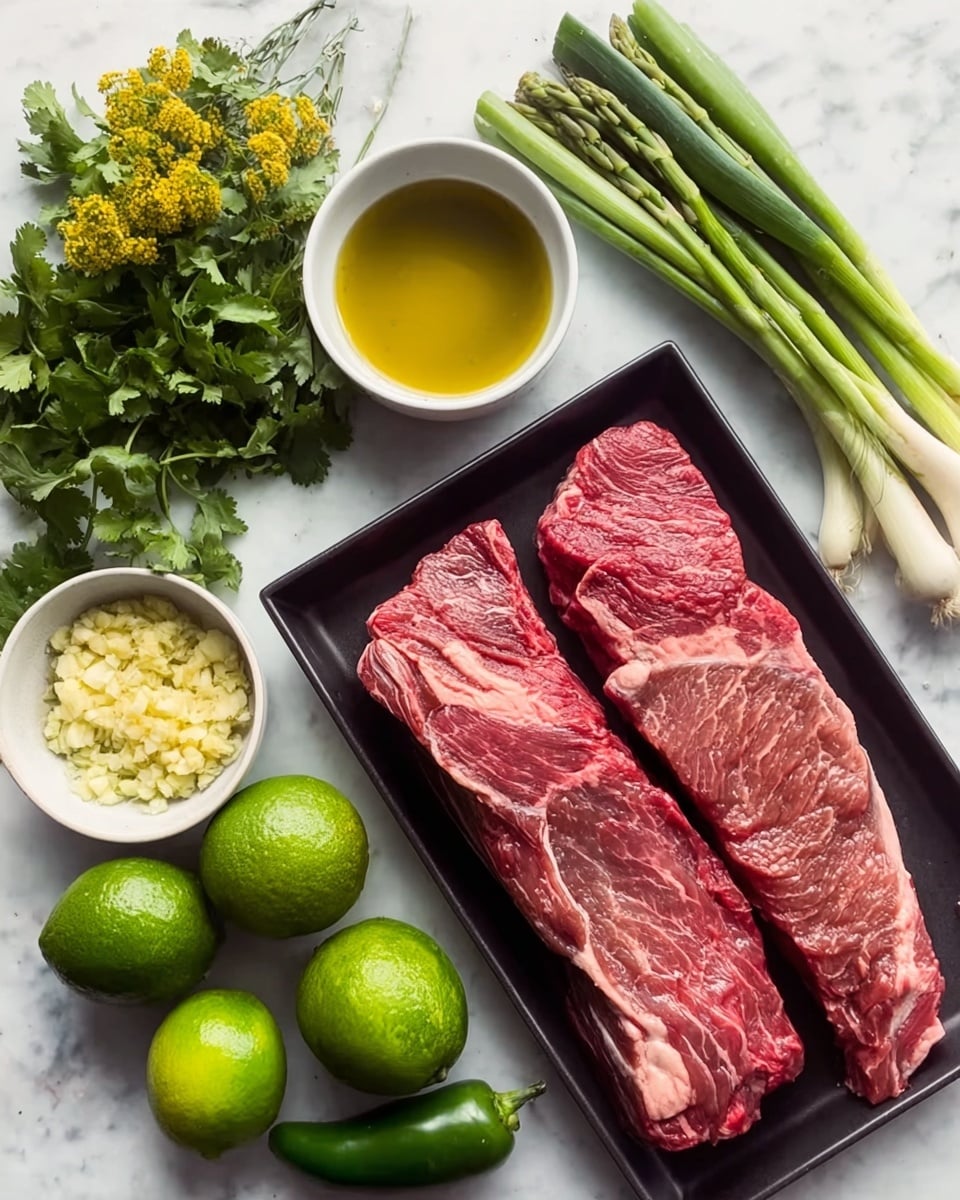 The image shows two large pieces of raw red meat with white marbling placed on a black tray in the lower right. To the left of the tray, there is a white bowl filled with golden olive oil above a smaller bowl containing minced garlic with a yellowish tint. Below these bowls, there are three whole green limes. Above the bowls and limes, there is a bundle of fresh green cilantro with yellow flowers on the left edge, green asparagus stems next to it, and two green jalapeño peppers lying side by side horizontally. At the top right, there are several light green spring onions with white ends, all rested on a white marbled surface. Photo taken with an iphone --ar 4:5 --v 7