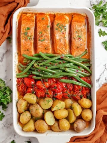 Maple Glazed Sheet Pan Salmon with Roasted Potatoes, Green Beans, and Cherry Tomatoes Recipe