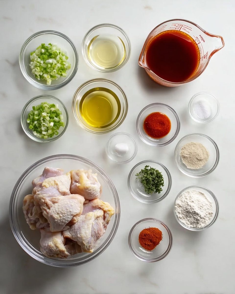 A clean white marbled surface holds a neat arrangement of clear glass bowls filled with raw ingredients. On the left, a large bowl contains several pieces of raw chicken with visible pale pink and light yellow tones. Surrounding it are smaller bowls: one with thin green scallions on the top left, another with clear light yellow oil below it, and one with white flour below that. To the right, a series of small bowls feature various ingredients such as finely chopped green herbs, black pepper, light orange powder, bright red sauce, clear liquids, and salt showing textural variety. A transparent measuring cup filled with a dark reddish-brown sauce is set towards the lower right. The setup is orderly, with all bowls placed evenly on the white marbled background. photo taken with an iphone --ar 4:5 --v 7