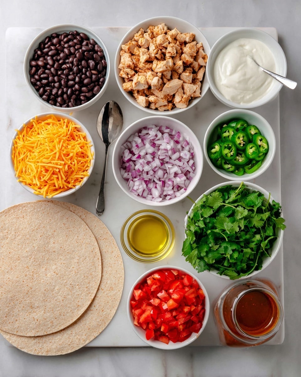 The image shows a flat lay of ingredients for a meal on a white marbled surface. There are two light brown tortillas placed on the bottom left corner. Above and around them, multiple white bowls hold different ingredients: diced cooked chicken with a light brown color, dark black beans, shredded orange cheddar cheese, chopped red onions, and diced red tomatoes. A small white bowl contains bright green chopped jalapeños. In the center, a smaller white bowl holds a bunch of fresh leafy green cilantro. A medium white bowl with white creamy sauce and a metal spoon is placed at the top right. A clear glass container filled with reddish-brown sauce sits near the top middle. A tiny clear glass cup with yellow cooking oil is at the lower left. The setup is neat and colorful with each ingredient distinct. Photo taken with an iphone --ar 4:5 --v 7