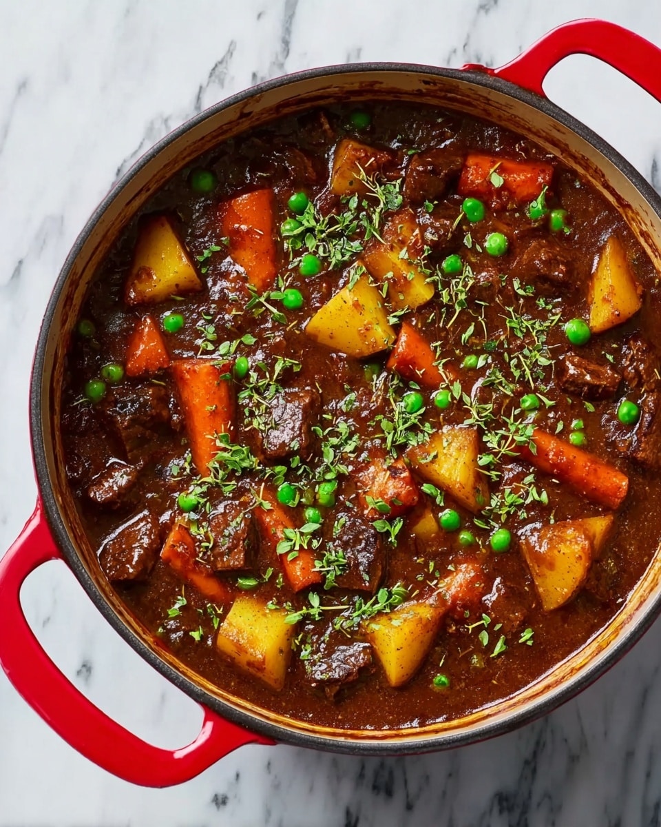A large round red pot filled with a rich, dark brown stew. The stew is thick and full of chunky pieces, with orange carrot slices scattered throughout. There are triangular yellow potato pieces mixed in, along with green peas spread evenly. Small pieces of dark brown meat are visible, and fresh green herbs are sprinkled on top for garnish. The pot is placed on a white marbled surface. photo taken with an iphone --ar 4:5 --v 7