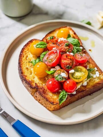 Savory French Toast with Parmesan, Blistered Cherry Tomatoes, and Basil Recipe