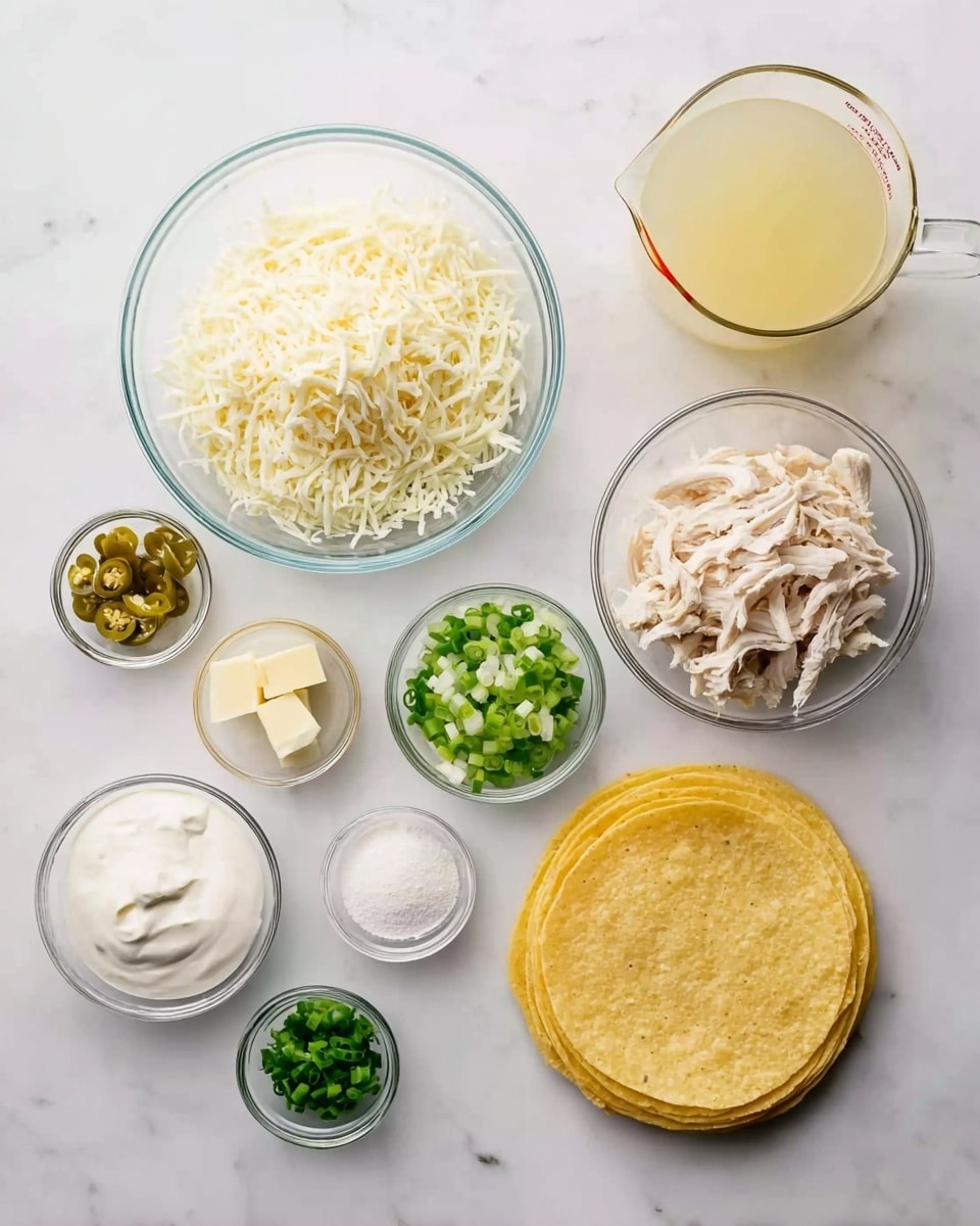 A top-down view of several clear glass bowls and a white measuring cup arranged neatly on a white marbled surface. The largest bowl is filled with shredded white cheese, positioned near the top center. Below it to the left, another bowl holds shredded white chicken. To the right of the chicken, a small bowl contains finely chopped white onions, and next to it is a bowl of chopped green onions. Above the onions, a bowl has sour cream with a smooth texture. Near the top left, a small bowl contains green chili peppers with some seeds. Below that, a tiny bowl has white flour powder, and next to it is a small bowl with two cubes of butter. At the bottom right, there is a neat stack of yellow corn tortillas. Finally, a clear measuring cup filled with light yellow broth sits at the top right of the arrangement. photo taken with an iphone --ar 4:5 --v 7