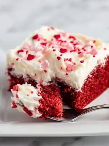 Red Velvet Poke Cake with White Chocolate Frosting and Marshmallow Filling Recipe
