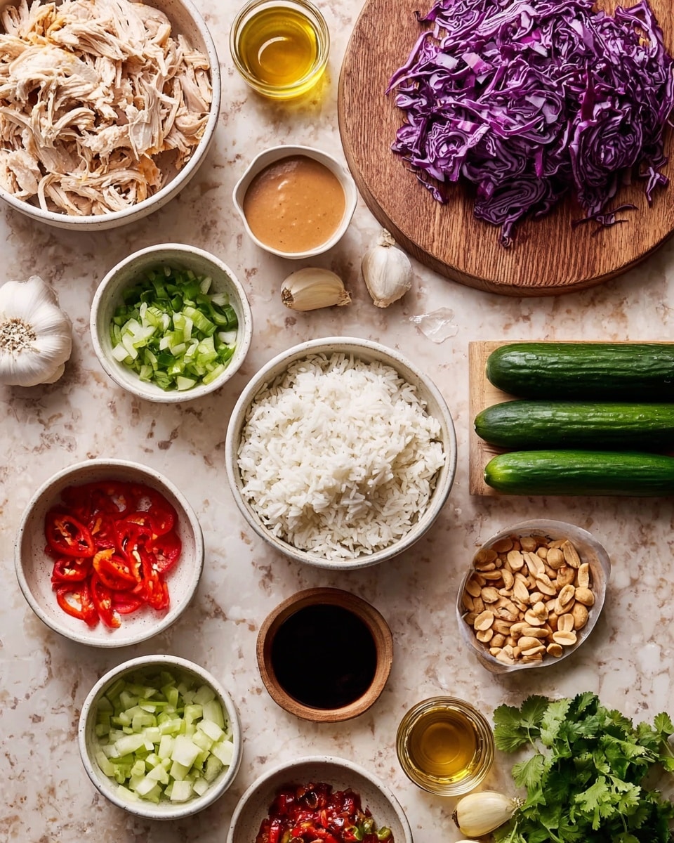 The image shows an overhead view of various ingredients on a white marbled surface. In the center-left, there is a white bowl filled with shredded chicken and another white bowl with plain white rice. Around these are smaller white bowls containing chopped green onions, a thick light brown sauce, and diced red peppers. To the top right, there are three long green cucumbers and a pile of shredded purple cabbage placed on a wooden board, with some fresh green cilantro nearby. A small white bowl holds crushed peanuts, and multiple small containers with different sauces and oils are scattered around, along with two bulbs of garlic. The colors range from white and beige to vibrant greens, reds, and purples, creating a bright and fresh arrangement. photo taken with an iphone --ar 4:5 --v 7