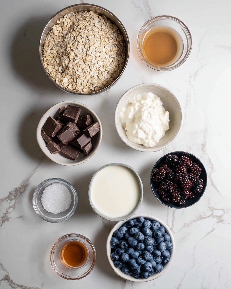 The image shows eight bowls with different ingredients arranged on a white marbled surface. In the top left, a large metal bowl is filled with light beige oats. To its right is a small clear glass bowl with light brown liquid, and below it, a medium metal bowl holds thick white cream. In the center left, a white bowl contains dark brown chocolate chunks. Below it, a metal bowl is filled with white milk. To the right side, a black bowl holds dark mixed berries, and below it, a white bowl contains fresh blueberries. Two small clear glass bowls near the bottom hold a light brown liquid and white salt. The ingredients are neatly placed in an organized pattern. photo taken with an iphone --ar 4:5 --v 7
