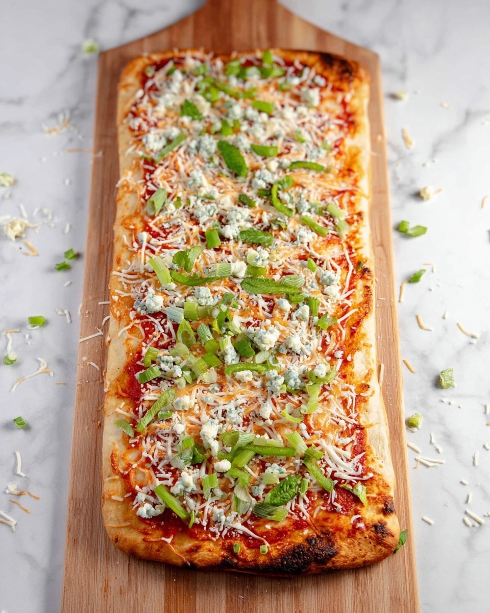 A long rectangular pizza on a wooden pizza peel is shown on a white marbled surface. The pizza has one thick crust layer that is golden brown with light charring on the edges. On top, there is a thin even layer of red tomato sauce spread under a generous layer of shredded white cheese. Scattered across the cheese are small pieces of green bell pepper and blue cheese crumbles. Green onion slices and leaves add a fresh green color sprinkled evenly over the whole pizza. Some shredded cheese and vegetable pieces are also scattered on the wooden pizza peel and marbled surface. Photo taken with an iphone --ar 4:5 --v 7