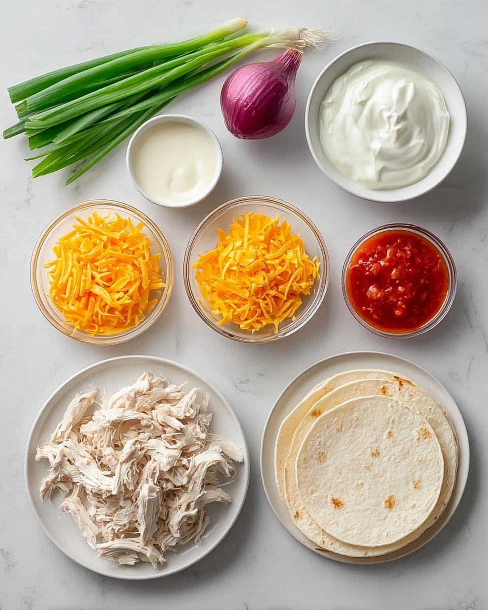 The image shows a flat white marbled background with nine separate ingredients arranged neatly in a grid. There is a bunch of fresh green onions on the top left, next to a halved purple onion. Above the center, a small white bowl holds a dollop of thick white sour cream. To the right, a small pile of bright orange shredded cheddar cheese rests directly on the surface. On the left middle, a clear glass bowl contains creamy white yogurt. Near the center, a white plate is filled with shredded cheddar cheese. To the right side, a clear bowl contains a bright red salsa with visible small chunks. On the bottom left, a white plate holds shredded white cooked chicken. In the center bottom, there is a white flour tortilla flat on the surface. On the bottom right, a glass bowl filled with a light orange liquid, likely juice, completes the composition. All items are clearly visible with soft natural light, photo taken with an iphone --ar 4:5 --v 7
