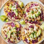 Fish Tacos with Cornslaw, Avocado, and Lime Recipe