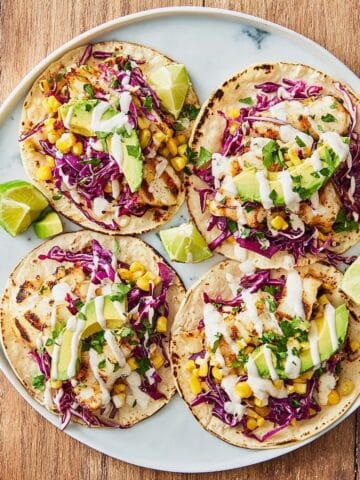 Fish Tacos with Cornslaw, Avocado, and Lime Recipe