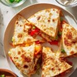 Chicken and Cheese Quesadillas with Peppers, Onions, and Avocado Recipe
