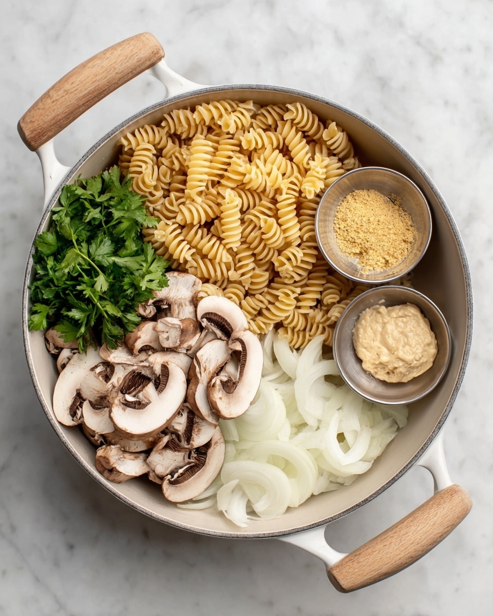 The image shows a white cooking pot with light brown wooden handles on a white marbled surface. Inside the pot, there are five main layers arranged separately: the top left has dry spiral pasta with a pale yellow color; below this is a bunch of bright green parsley leaves; the bottom left is filled with sliced brown mushrooms showing their white inner flesh; to the right side of mushrooms are thick off-white sliced onion pieces; and on the top right there are two small metal bowls, one holding yellow powder and the other containing a creamy beige paste. The ingredients have clear textures with the pasta dry, the mushrooms fresh, and the onion smooth. photo taken with an iphone --ar 4:5 --v 7