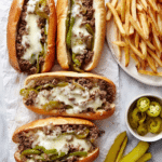 Philly Cheesesteak Sandwiches with Mushrooms, Bell Peppers, and Provolone Recipe
