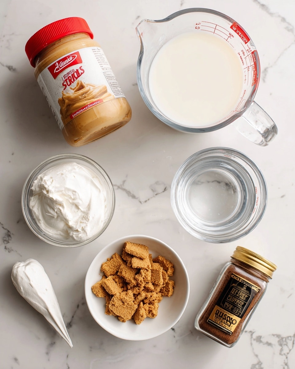 The image shows several ingredients placed on a white marbled surface. There is a jar of creamy cookie butter with a red lid and red and white label on the top left. To its right, there is a clear glass measuring cup filled with milk, showing white liquid inside. Below this, a clear glass measuring cup holds water, showing transparent liquid. Near the center, a small white bowl is filled with broken pieces of Biscoff cookies, showing light brown crumbly texture. On the bottom left, a piping bag filled with white whipped cream is placed pointing to the bottom left corner. On the bottom right, a jar of espresso powder with a gold lid and brown label is positioned diagonally. The overall scene is bright and clean with all objects clearly visible. Photo taken with an iphone --ar 4:5 --v 7